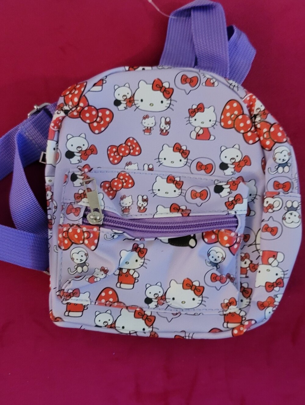Hello Kitty Lavender Mini Backpack with Red Bow Pattern